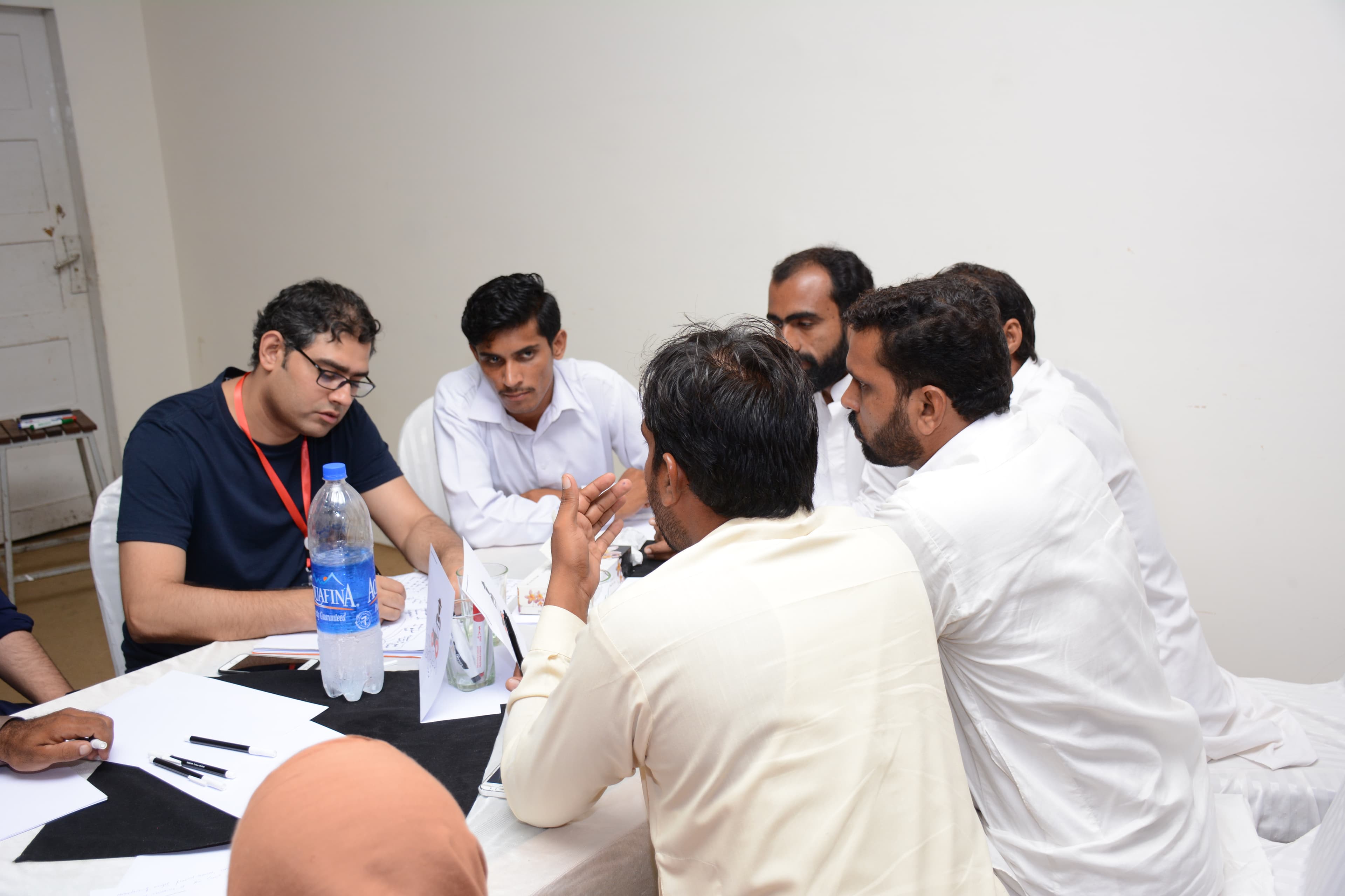 Full room of implementing partners during a quarterly design sprint